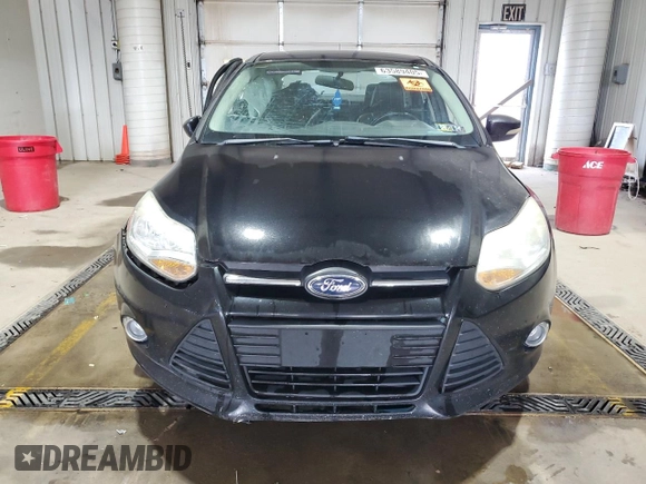 2013 Ford Focus SE with VIN 1FADP3F21DL348827, listed as a Copart auction lot 63589405 with 144,156 mi miles and Salvage title. Bid and sale history available at DreamBid. Image 5.