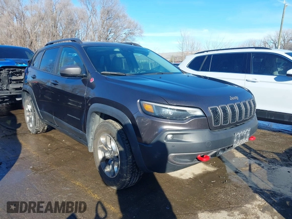 2019 Jeep Cherokee Trailhawk Elite with VIN 1C4PJMBX9KD369142, listed as a IAAI auction lot 41337108 with 66,780 mi miles. Bid and sale history available at carsss.com. Image 1.