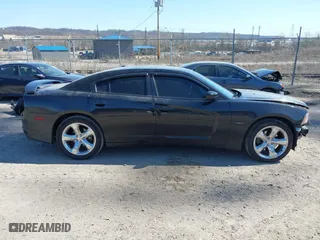 2014 Dodge Charger RT 100th Anniversary with VIN 2C3CDXCT4EH261977, listed as a IAAI auction lot 41815504 with 92,478 mi miles. Bid and sale history available at carsss.com. Image 14.