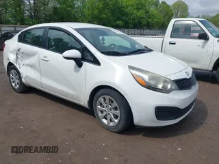 2013 Kia Rio LX with VIN KNADM4A39D6318169, listed as a IAAI auction lot 42063285 with 138,272 mi miles and . Bid and sale history available at DreamBid. Image 1.