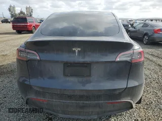 2024 Tesla Model Y с VIN 7SAYGDED9RF092955, выставлен на аукционе Copart как лот 51114245 с пробегом 6 385 миль миль и Списание • Salvage title. История ставок и продаж доступна на DreamBid. Изображение 6.