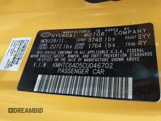 2012 Hyundai Veloster w/Black Int with VIN KMHTC6AD5CU046702, listed as a IAAI auction lot 42245379 with 136,327 mi miles and . Bid and sale history available at DreamBid. Image 9.