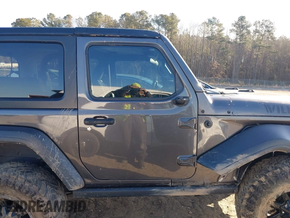 2021 Jeep Wrangler Sport S with VIN 1C4GJXAGXMW863259, listed as a IAAI auction lot 41399671 with 41,270 mi miles and . Bid and sale history available at DreamBid. Image 13.
