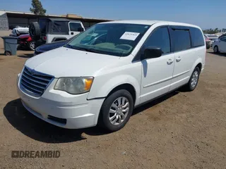 2009 Chrysler Town & Country LX with VIN 2A8HR44E79R549129, listed as a IAAI auction lot 42079369 with 102,805 mi miles. Bid and sale history available at carsss.com. Image 2.
