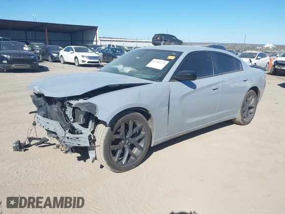 2022 Dodge Charger SXT with VIN 2C3CDXBG7NH208839, listed as a IAAI auction lot 41701171 with 71,552 mi miles and . Bid and sale history available at DreamBid. Image 18.