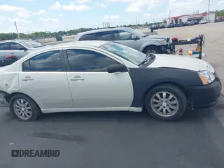 2009 Mitsubishi Galant ES z VIN 4A3AB36F89E032882, wystawiony jako IAAI lot #42305057 z przebiegiem 211 742 mil mil oraz . Historia ofert i sprzedaży dostępna na DreamBid. Obrazek 14.