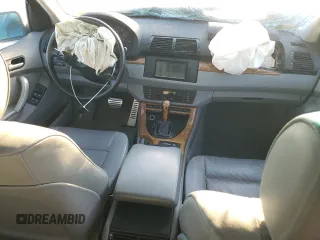 2000 BMW X5 4.4i with VIN WBAFB3355YLH05755, listed as a Copart auction lot 77136744 with 0 mi miles and Salvage Title. Bid and sale history available at carsss.com. Image 8.