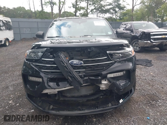2022 Ford Explorer XLT with VIN 1FMSK8DH9NGA52903, listed as a IAAI auction lot 42704656 with 63,591 mi miles and . Bid and sale history available at DreamBid. Image 12.