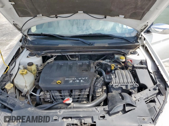 2013 Chrysler 200 LX z VIN 1C3CCBAB6DN763329, wystawiony jako Copart lot #58953035 z przebiegiem 162 879 mil mil oraz Szkoda całkowita • Salvage title. Historia ofert i sprzedaży dostępna na DreamBid. Obrazek 11.