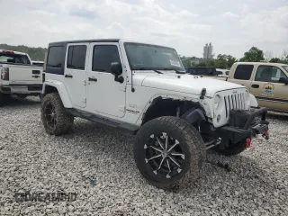 2014 Jeep Wrangler Unlimited Sahara with VIN 1C4BJWEG8EL266340, listed as a Copart auction lot 57809465 with 121,191 mi miles and Salvage title. Bid and sale history available at DreamBid. Image 4.