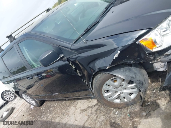 2018 Dodge Grand Caravan SE Plus with VIN 2C4RDGBG3JR170116, listed as a IAAI auction lot 41922061 with 74,149 mi miles. Bid and sale history available at carsss.com. Image 13.