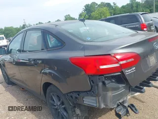 2018 Ford Focus SE with VIN 1FADP3F29JL288761, listed as a IAAI auction lot 42290510 with 93,463 mi miles and . Bid and sale history available at DreamBid. Image 18.
