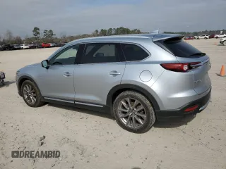 2020 Mazda CX-9 Grand Touring z VIN JM3TCADY0L0417673, wystawiony jako Copart lot #44625195 z przebiegiem 94 221 mil mil oraz Szkoda całkowita • Salvage title. Historia ofert i sprzedaży dostępna na DreamBid. Obrazek 2.
