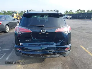 2017 Toyota RAV4 LE with VIN JTMZFREV4HJ136104, listed as a IAAI auction lot 42077699 with 120,360 mi miles and . Bid and sale history available at carsss.com. Image 16.