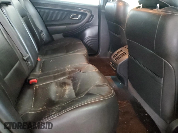 2013 Ford Taurus Limited с VIN 1FAHP2F81DG136504, выставлен на аукционе Copart как лот 56498075 с пробегом 191 342 миль миль и Списание • Salvage title. История ставок и продаж доступна на DreamBid. Изображение 10.