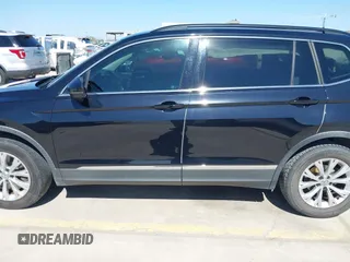 2018 Volkswagen Tiguan SEL with VIN 3VV3B7AX3JM064061, listed as a IAAI auction lot 41772564 with 95,395 mi miles and . Bid and sale history available at DreamBid. Image 14.