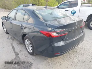 2025 Toyota Camry LE with VIN 4T1DAACKXSU541257, listed as a IAAI auction lot 42052246 with 13,585 mi miles and . Bid and sale history available at DreamBid. Image 3.