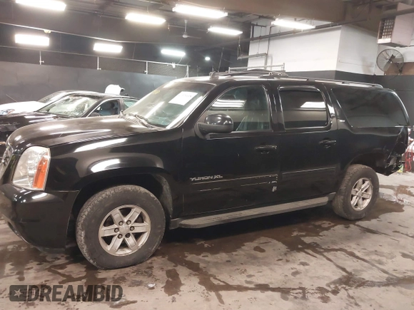 2013 GMC Yukon XL SLT with VIN 1GKS2KE76DR301365, listed as a IAAI auction lot 41379118 with 108,569 mi miles. Bid and sale history available at carsss.com. Image 15.