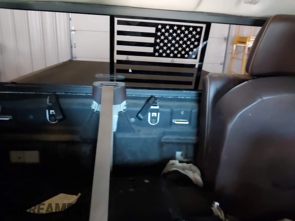 2015 Ram 1500 Laramie Limited with VIN 1C6RR7WM6FS678840, listed as a IAAI auction lot 42040449 with Not provided miles and . Bid and sale history available at DreamBid. Image 8.