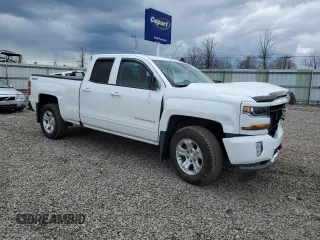 2017 Chevrolet Silverado 1500 LT with VIN 1GCVKREC3HZ216455, listed as a Copart auction lot 52576385 with 73,528 mi miles and Salvage Title. Bid and sale history available at DreamBid. Image 4.