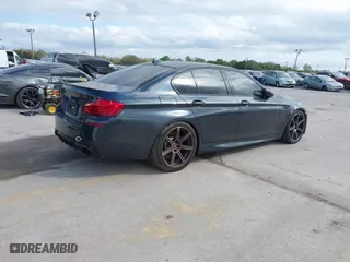 2013 BMW M5 with VIN WBSFV9C59DD096774, listed as a IAAI auction lot 41608286 with 82,601 mi miles. Bid and sale history available at carsss.com. Image 4.