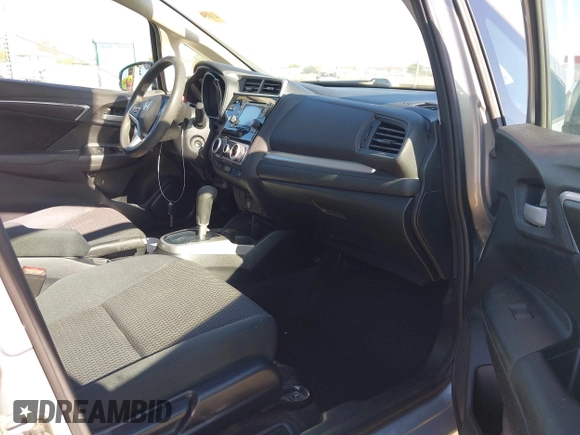 2020 Honda Fit LX z VIN 3HGGK5H48LM700879, wystawiony jako IAAI lot #42290266 z przebiegiem 90 963 mil mil oraz . Historia ofert i sprzedaży dostępna na DreamBid. Obrazek 5.