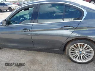 2013 BMW 3 Series 328i xDrive with VIN WBA3B3G56DNR81144, listed as a IAAI auction lot 40620694 with 159,022 mi miles. Bid and sale history available at carsss.com. Image 14.