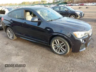 2015 BMW X4 xDrive35i with VIN 5UXXW5C57F0E87516, listed as a IAAI auction lot 41837073 with 139,843 mi miles. Bid and sale history available at carsss.com. Image 1.