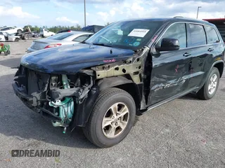 2017 Jeep Grand Cherokee Laredo with VIN 1C4RJEAG5HC663930, listed as a IAAI auction lot 41684918 with 91,063 mi miles. Bid and sale history available at carsss.com. Image 2.