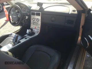 2006 Chrysler Crossfire Limited z VIN 1C3AN69LX6X066503, wystawiony jako Copart lot #73347344 z przebiegiem 68 420 mil mil oraz Szkoda całkowita • Salvage title. Historia ofert i sprzedaży dostępna na DreamBid. Obrazek 8.