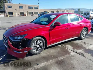 2020 Hyundai Sonata Hybrid Blue with VIN KMHL24JJ1LA009550, listed as a IAAI auction lot 41265226 with 85,347 mi miles. Bid and sale history available at carsss.com. Image 18.