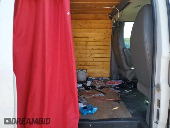 2013 Chevrolet Express Cargo с VIN 1GCWGFBA2D1115617, выставлен на аукционе Copart как лот 61756645 с пробегом 302 668 миль миль и Списание • Salvage title. История ставок и продаж доступна на DreamBid. Изображение 10.