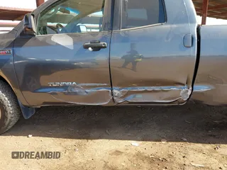 2010 Toyota Tundra 4WD Truck with VIN 5TFUY5F18AX111590, listed as a IAAI auction lot 41725142 with 116,360 mi miles. Bid and sale history available at carsss.com. Image 17.