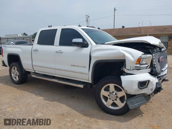 2015 GMC Sierra 2500HD Denali z VIN 1GT120E89FF190917, wystawiony jako IAAI lot #42271537 z przebiegiem 149 307 mil mil oraz . Historia ofert i sprzedaży dostępna na DreamBid. Obrazek 1.