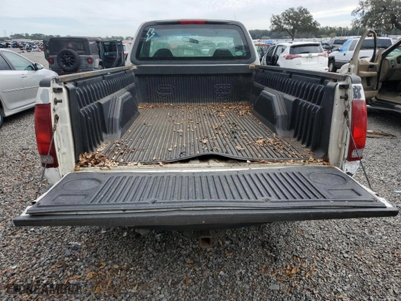 1999 Ford F-150 Work Series with VIN 1FTRF17W0XNB79739, listed as a Copart auction lot 87840925 with 0 mi miles and Salvage Title. Bid and sale history available at carsss.com. Image 10.