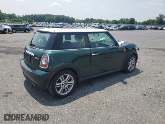2011 MINI Hardtop with VIN WMWSU3C51BTX95581, listed as a Copart auction lot 60443995 with 157,213 mi miles and Salvage title. Bid and sale history available at DreamBid. Image 3.