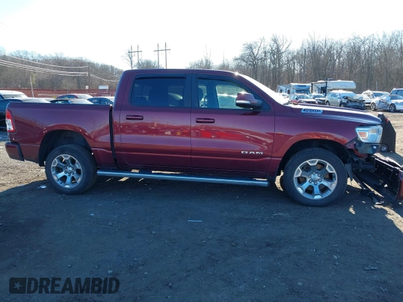 2019 Ram 1500 Big Horn/Lone Star with VIN 1C6SRFFT2KN647936, listed as a IAAI auction lot 41294403 with 123,834 mi miles. Bid and sale history available at carsss.com. Image 13.