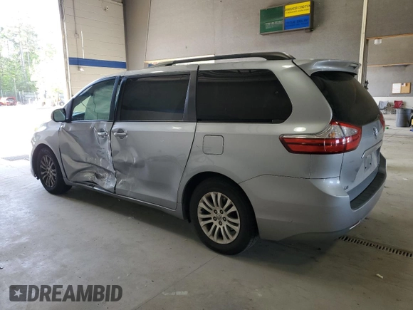 2015 Toyota Sienna XLE with VIN 5TDYK3DC9FS589378, listed as a Copart auction lot 54219075 with 117,766 mi miles and Salvage Title. Bid and sale history available at DreamBid. Image 2.