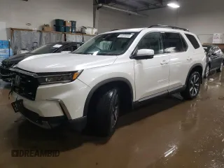 2023 Honda Pilot Elite with VIN 5FNYG1H89PB005675, listed as a Copart auction lot 44009895 with 35,514 mi miles and Salvage Title. Bid and sale history available at carsss.com. Image 1.