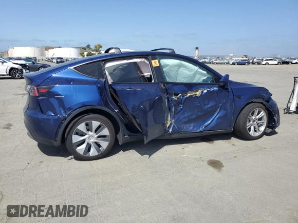 2023 Tesla Model Y Long Range with VIN 7SAYGAEE8PF927092, listed as a Copart auction lot 53917185 with 17,639 mi miles and Salvage Title. Bid and sale history available at DreamBid. Image 3.