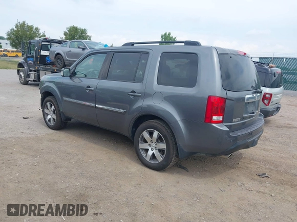 2013 Honda Pilot Touring with VIN 5FNYF3H9XDB024500, listed as a IAAI auction lot 42683695 with 151,441 mi miles and . Bid and sale history available at DreamBid. Image 3.