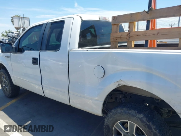 2014 Ford F-150 XL with VIN 1FTEX1CMXEFD13082, listed as a IAAI auction lot 40035539 with 204,751 mi miles and . Bid and sale history available at DreamBid. Image 15.