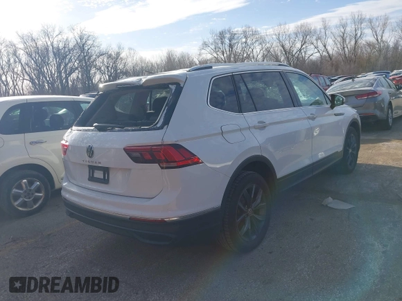 2022 Volkswagen Tiguan SE with VIN 3VV3B7AX9NM076592, listed as a IAAI auction lot 41816250 with 52,688 mi miles and . Bid and sale history available at DreamBid. Image 4.