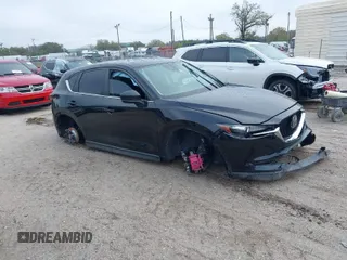 2019 Mazda CX-5 Touring with VIN JM3KFACM0K0692007, listed as a IAAI auction lot 41645657 with 1 mi miles. Bid and sale history available at carsss.com. Image 1.
