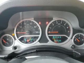 2009 Jeep Wrangler Unlimited Rubicon with VIN 1J8GA69109L761089, listed as a Copart auction lot 57975985 with 195,530 mi miles and Salvage title. Bid and sale history available at DreamBid. Image 9.