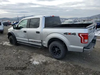 2015 Ford F-150 XLT with VIN 1FTEW1EG1FFA90068, listed as a Copart auction lot 84421594 with 150,386 mi miles and Salvage title. Bid and sale history available at DreamBid. Image 2.