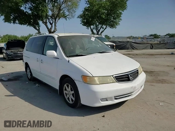 2001 Honda Odyssey EX z VIN 2HKRL18661H500391, wystawiony jako Copart lot #57249725 z przebiegiem 207 905 mil mil oraz Szkoda całkowita • Salvage title. Historia ofert i sprzedaży dostępna na DreamBid. Obrazek 14.
