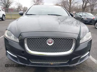 2014 Jaguar XJ with VIN SAJWA1CZ0E8V73966, listed as a IAAI auction lot 41887234 with 120,804 mi miles and . Bid and sale history available at DreamBid. Image 12.