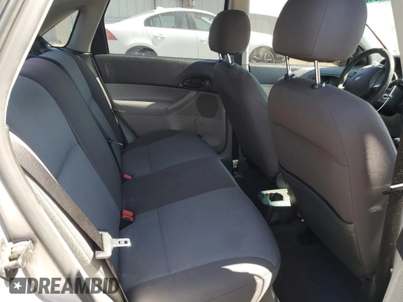 2007 Ford Focus S z VIN 1FAFP34N97W264411, wystawiony jako Copart lot #53251655 z przebiegiem 159 516 mil mil oraz Szkoda całkowita • Salvage title. Historia ofert i sprzedaży dostępna na DreamBid. Obrazek 10.