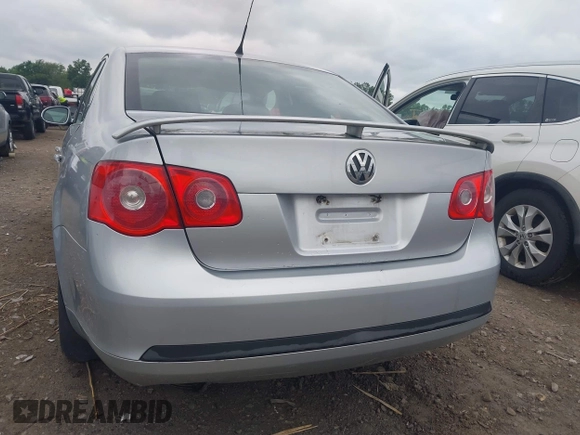 2007 Volkswagen Jetta Wolfsburg Edition z VIN 3VWEF71K77M166713, wystawiony jako IAAI lot #42746458 z przebiegiem 214 241 mil mil oraz . Historia ofert i sprzedaży dostępna na DreamBid. Obrazek 16.